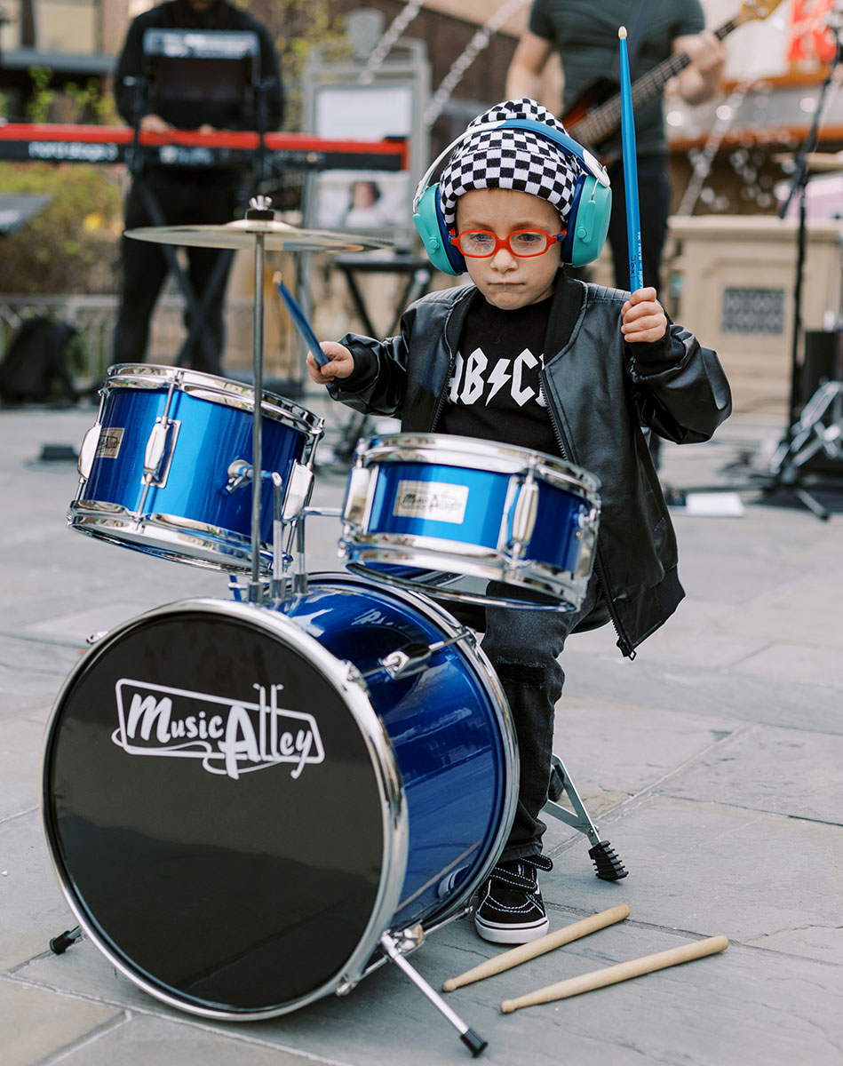 Jax plays drums live on stage!